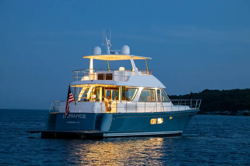 Slide: The Image of Hunt Yachts Ocean 63 Flybridge 2020 at sunset on the water. - 2
