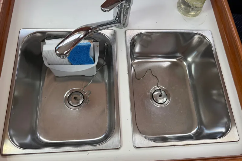 Slide: The Image of Stainless steel double sink on 2009 Beneteau Oceanis 31 yacht kitchen. - 47