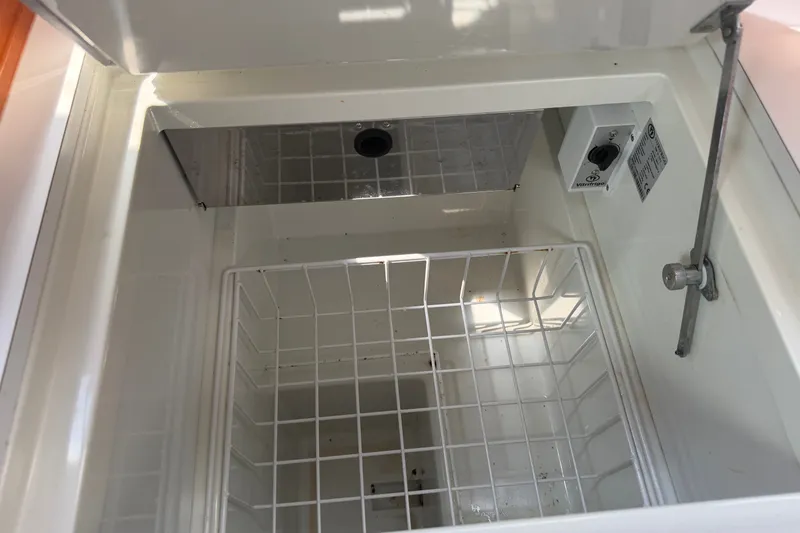 Slide: The Image of Open storage compartment on a 2009 Beneteau Oceanis 31 sailboat. - 48