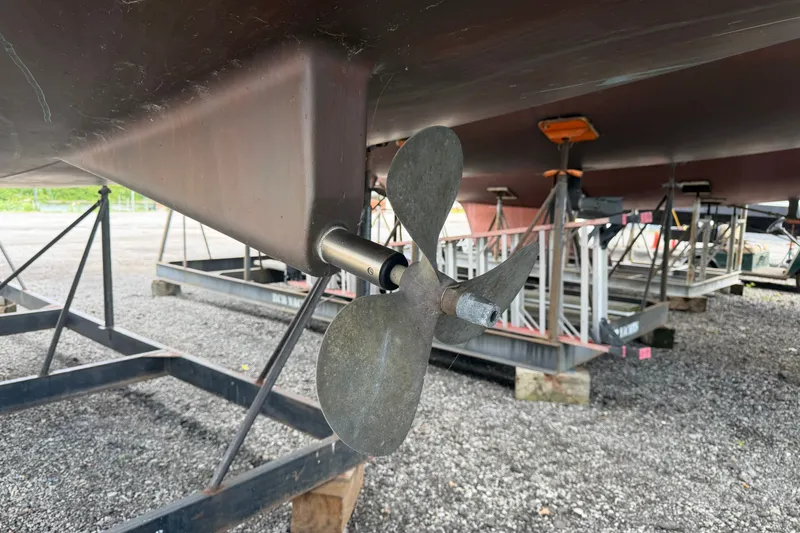Slide: The Image of Propeller of 2009 Beneteau Oceanis 31 sailboat on dry dock. - 55