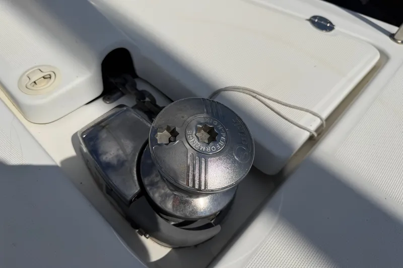 Slide: The Image of Winch on 2009 Beneteau Oceanis 31 sailboat deck, featuring a sleek design. - 53