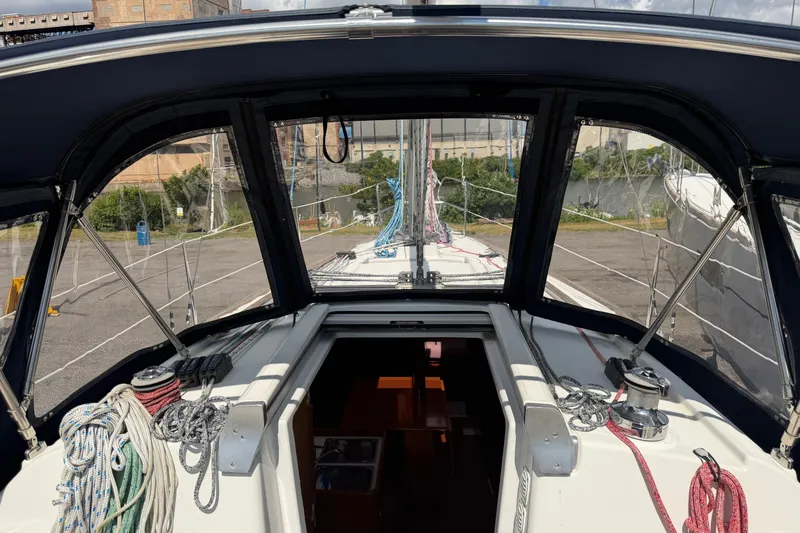 Slide: The Image of Cockpit view of a 2009 Beneteau Oceanis 31 sailboat with ropes and winches. - 7