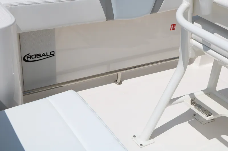 Slide: The Image of 2026 Robalo R230 Center Console boat interior with seating and branding details. - 32