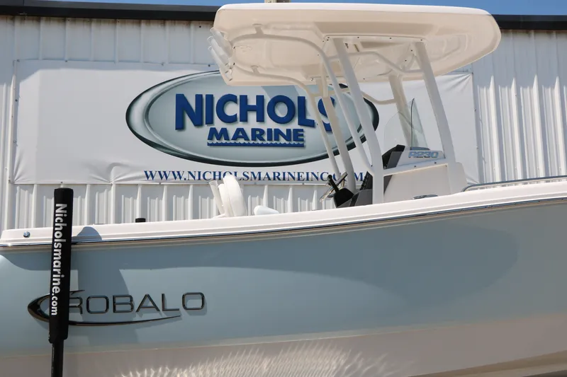 Slide: The Image of 2026 Robalo R230 Center Console boat at Nichols Marine dealership. - 12