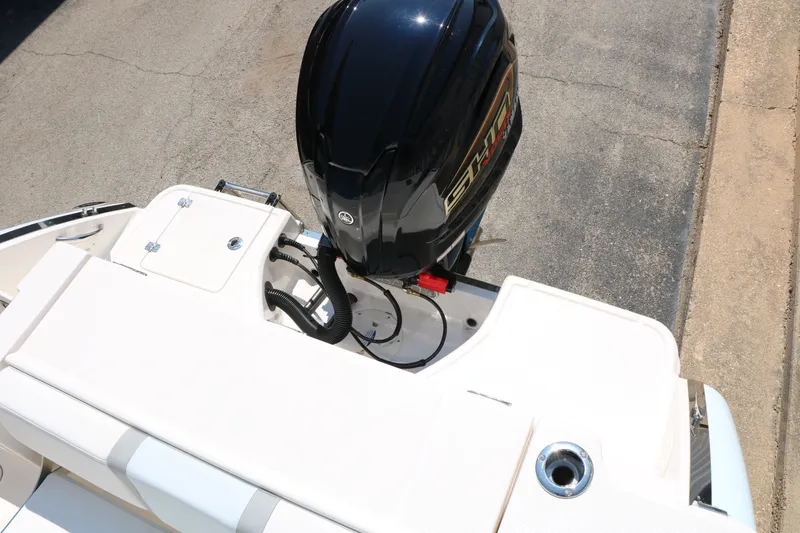 Slide: The Image of 2026 Robalo R230 Center Console boat with powerful outboard motor. - 30
