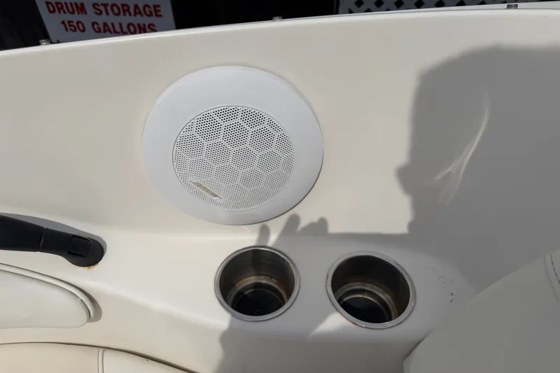Slide: The Image of Interior of 2009 Monterey 234FS boat with speaker and cup holders. - 27
