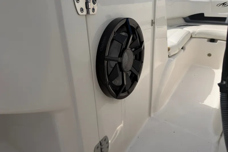 Slide: The Image of Speaker installed on a 2009 Monterey 234FS boat interior. - 35