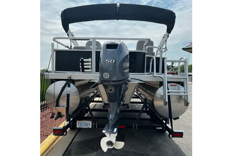Slide: The Image of 2023 Bennington 20 SF pontoon boat with Yamaha 50 HP outboard motor. - 1