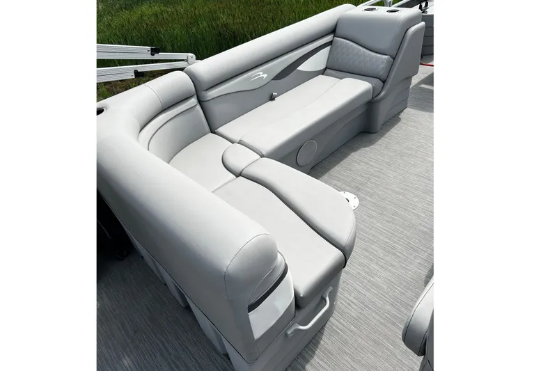 Slide: The Image of 2023 Bennington 20 SF boat interior with plush gray seating and cup holders. - 4