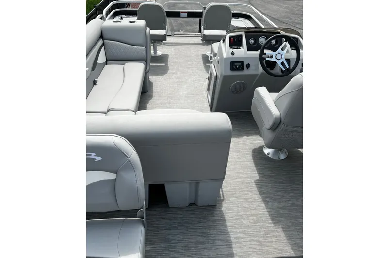 Slide: The Image of 2023 Bennington 20 SF pontoon boat interior with gray seating and steering console. - 5