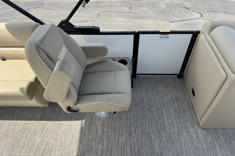 Slide: The Image of Interior of 2027 Godfrey Xperience 23' Split Bench with beige seating and carpet flooring. - 15