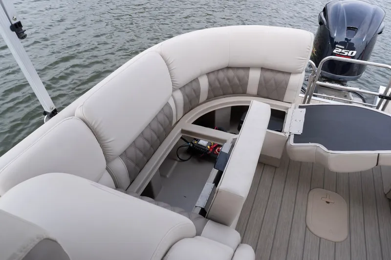 Slide: The Image of 2017 Bennington R25 boat interior with plush seating and Yamaha 250 engine. - 23