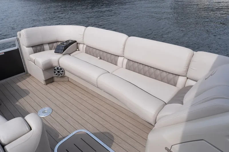 Slide: The Image of Luxurious seating on a 2017 Bennington R25 pontoon boat with elegant upholstery. - 13