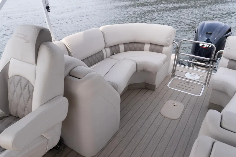 Slide: The Image of Luxurious seating on 2017 Bennington R25 pontoon boat with powerful 250 horsepower engine. - 22