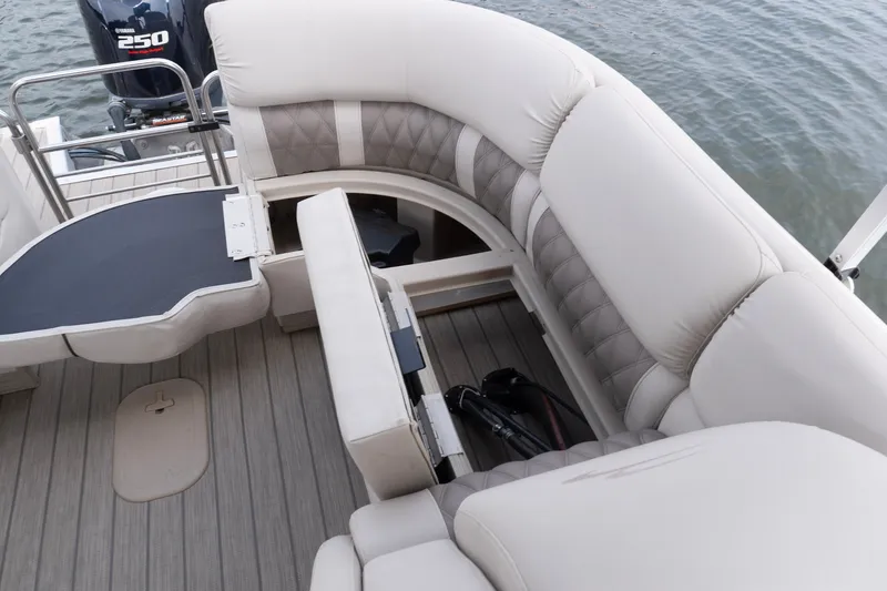 Slide: The Image of 2017 Bennington R25 boat interior with plush seating and Yamaha 250 engine. - 25
