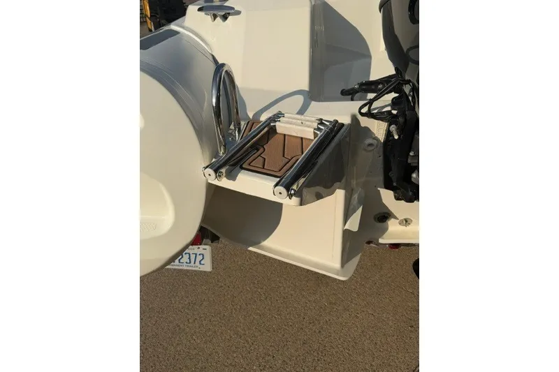 Slide: The Image of 2020 Brig Eagle 6.7 boat ladder and platform detail in sunlight. - 10