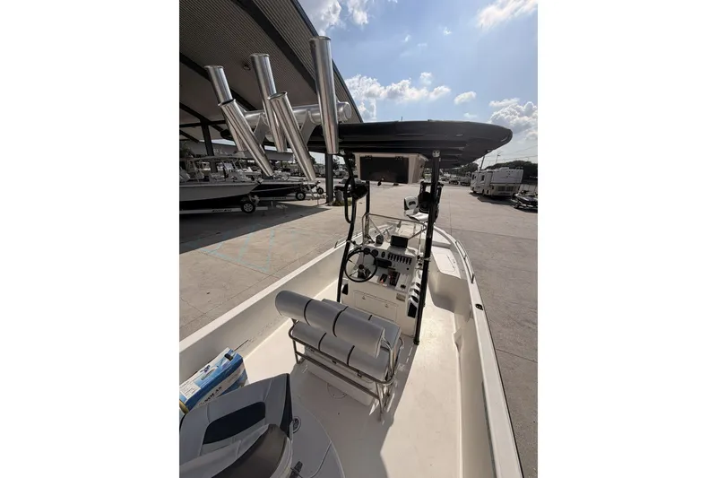 Slide: The Image of Century 2101 Bay Boat 2000 model, featuring a center console and rod holders. - 17
