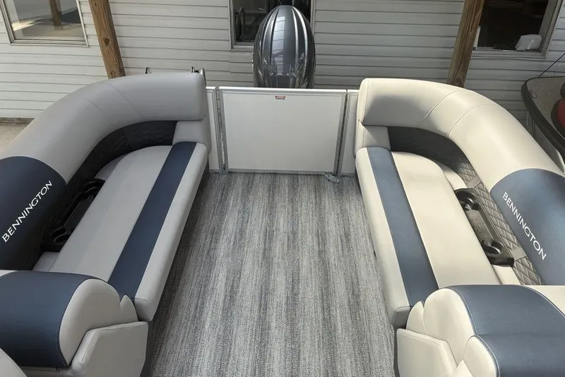 Slide: The Image of 2027 Bennington 22 SSR pontoon boat interior with plush seating and modern design. - 8