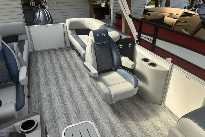Slide: The Image of 2027 Bennington 22 SSR pontoon boat interior with plush seating and modern design. - 6