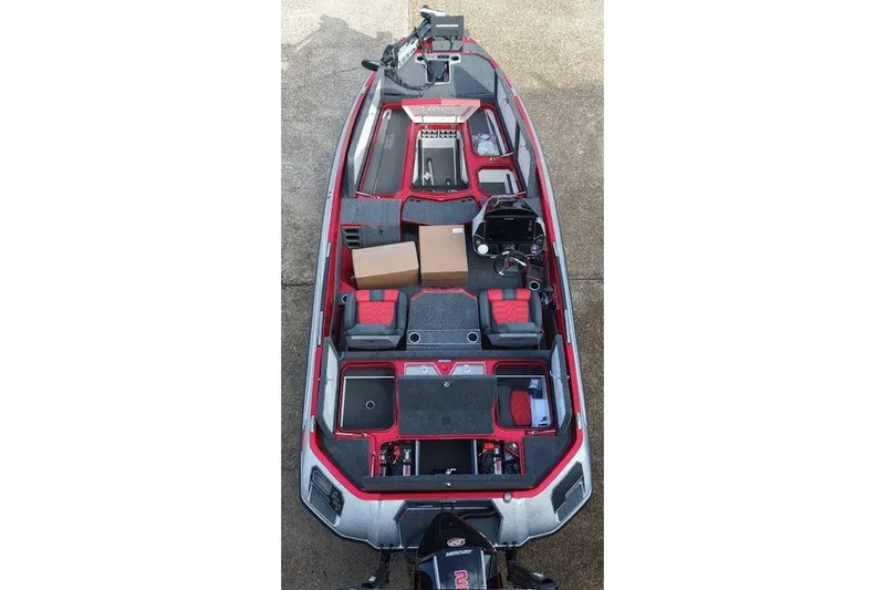 Slide: The Image of 2026 Vexus VXs20 boat interior with red accents and storage compartments. - 10