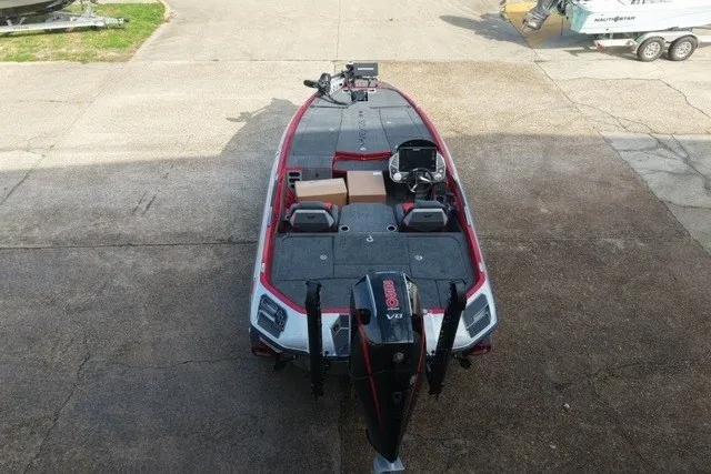 Slide: The Image of 2026 Vexus VXs20 boat on concrete, featuring dual seats and a sleek design. - 3