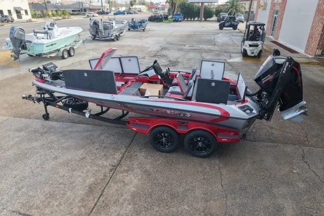 Slide: The Image of 2026 Vexus VXs20 boat in a parking lot, featuring sleek design and modern equipment. - 6