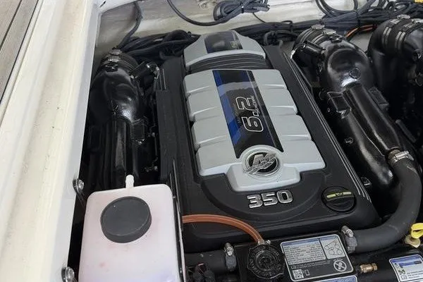 Slide: The Image of Engine compartment of a 2022 Sea Ray SLX 310 boat, featuring a 6.2L 350 horsepower engine. - 7