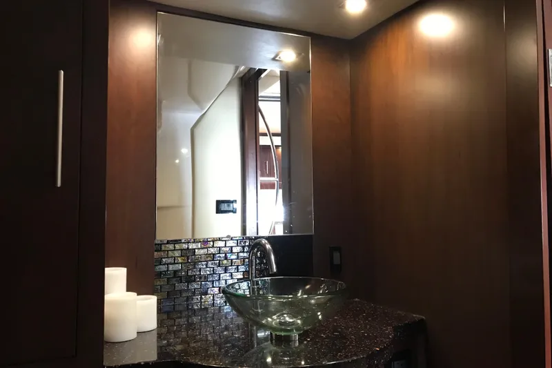 Slide: The Image of Luxurious bathroom interior of 2013 Regal 42 Sport Coupe with glass sink and modern design. - 30