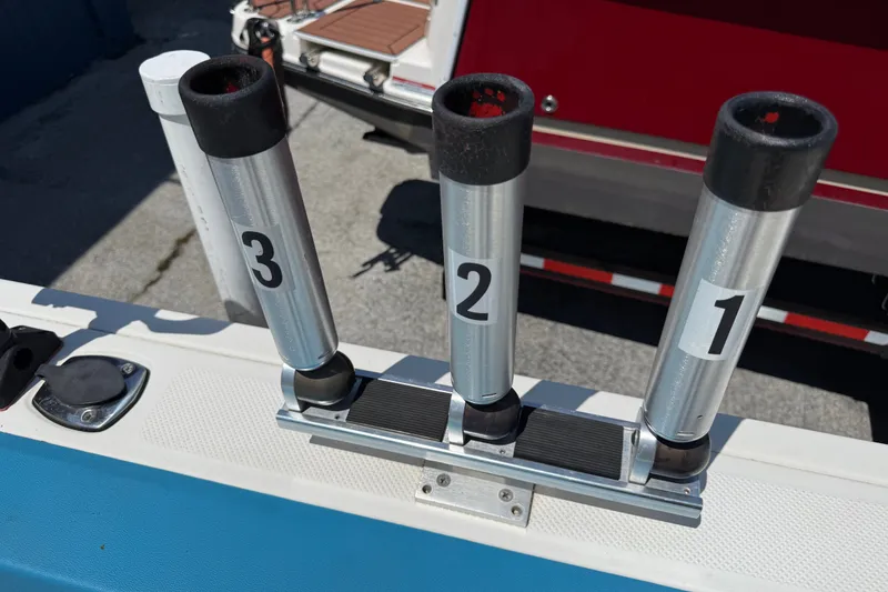 Slide: The Image of Rod holders on a 2002 Bayliner Trophy Walkaround boat, numbered 1 to 3. - 21