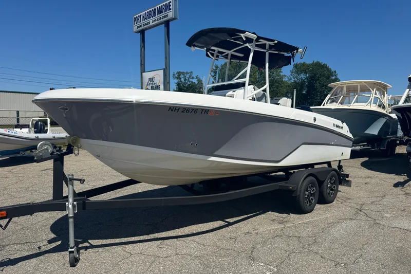 The Image of 2023 Wellcraft 202 Fisherman boat on trailer at Port Harbor Marine dealership. - 1