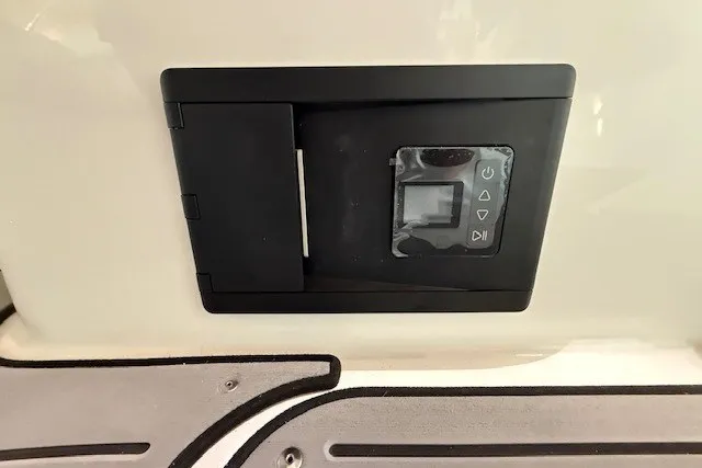 Slide: The Image of Control panel on 2026 Hurricane SunDeck Sport 2050 OB boat, featuring sleek design and modern interface. - 28