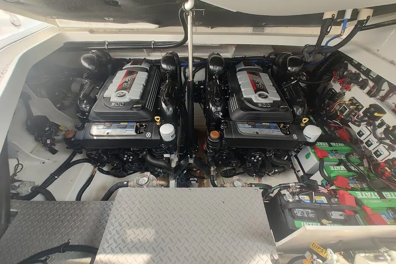 Slide: The Image of Engine compartment of 2024 Sea Ray Sundancer 320 Coupe with dual 6.2L engines. - 37