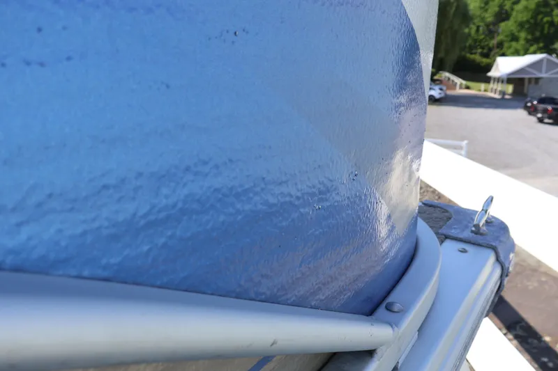 Slide: The Image of Close-up of a blue 2008 Premier 210 Sunsation boat exterior with textured surface. - 5
