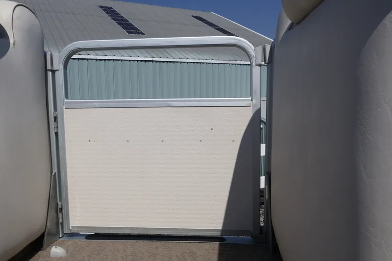 Slide: The Image of 2008 Premier 210 Sunsation boat gate with metal frame and fabric panel. - 51