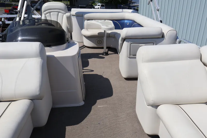 Slide: The Image of 2008 Premier 210 Sunsation pontoon boat with white seating and spacious deck layout. - 58