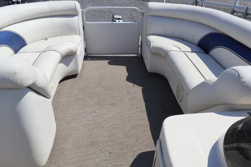 Slide: The Image of Interior of a 2008 Premier 210 Sunsation pontoon boat with white seating. - 57