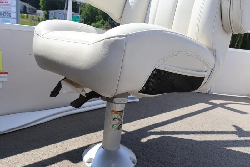 Slide: The Image of White captain's chair on 2008 Premier 210 Sunsation boat, featuring adjustable pedestal base. - 36