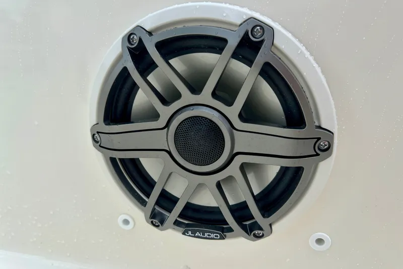 Slide: The Image of JL Audio speaker on 2026 Boston Whaler 250 Dauntless boat. - 36
