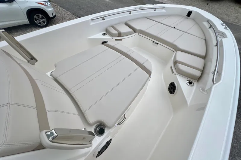 Slide: The Image of 2026 Boston Whaler 250 Dauntless boat interior with spacious seating and sleek design. - 29