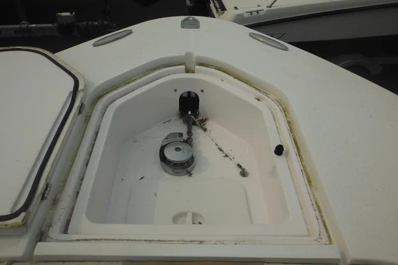 Slide: The Image of Anchor compartment of a 2006 Southport 26 Center Console boat. - 18