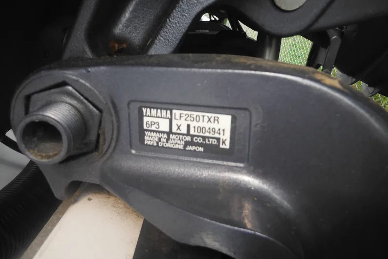 Slide: The Image of Close-up of Yamaha LF250TXR engine part on a 2006 Southport 26 Center Console boat. - 7