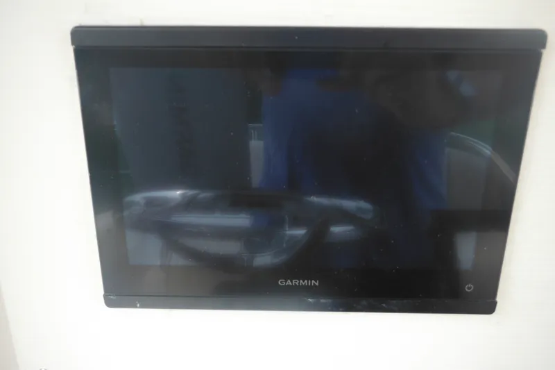 Slide: The Image of Garmin display on 2006 Southport 26 Center Console boat dashboard. - 40