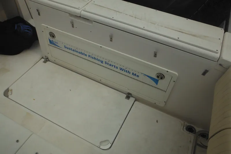 Slide: The Image of 2006 Southport 26 Center Console boat with "Sustainable Fishing Starts With Me" message. - 46