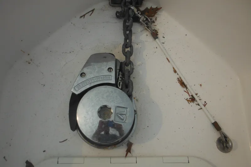 Slide: The Image of Anchor chain and windlass on 2006 Southport 26 Center Console boat deck. - 20
