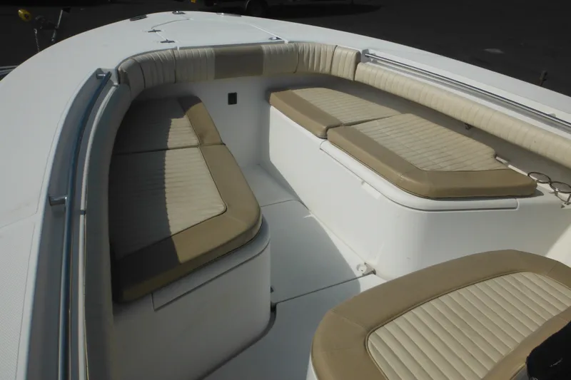 Slide: The Image of 2006 Southport 26 Center Console boat interior with cushioned seating. - 74