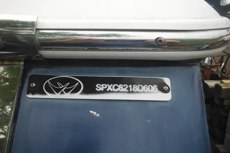 Slide: The Image of 2006 Southport 26 Center Console boat identification plate with serial number SPXC6218D606. - 13
