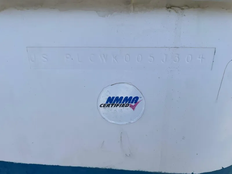 Slide: The Image of Close-up of a 2004 Pro-Line 30 Express Walkaround hull with NMMA certification. - 38
