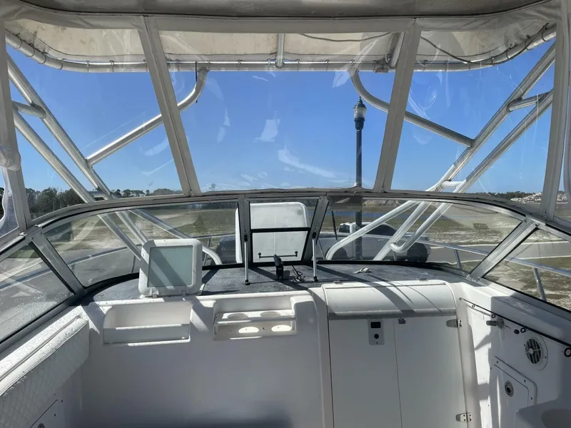 Slide: The Image of The image shows the cockpit of a 2004 Pro-Line 30 Express Walkaround with a clear forward view. - 21