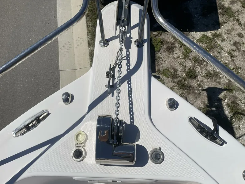 Slide: The Image of Close-up of a 2004 Pro-Line 30 Express Walkaround bow with anchor chain and windlass. - 14