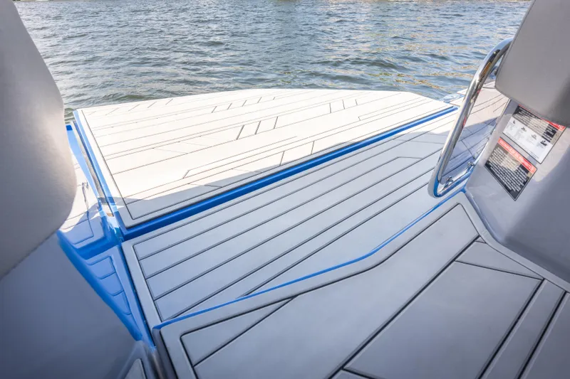 Slide: The Image of 2026 Hanover 347 boat deck with sleek design and water view. - 13